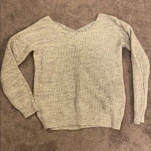 Grey sweater with crossed open back